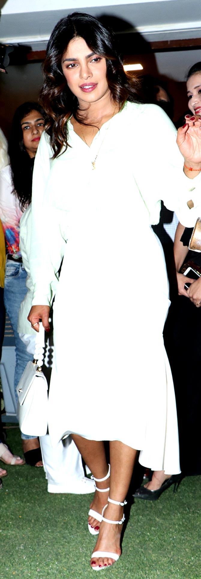 Priyanka Chopra, Siddharth Chopra, and Mannara Chopra attended Madhu Chopra's clinic launch held in Juhu, Mumbai. The Chopra family was all present at the event. Priyanka Chopra also shared it on her social media account and congratulated the doctor, Madhu Chopra. All pictures/Yogen Shah
In picture: Priyanka Chopra Jonas, as she arrives at the event launch, was clicked by the paps. 