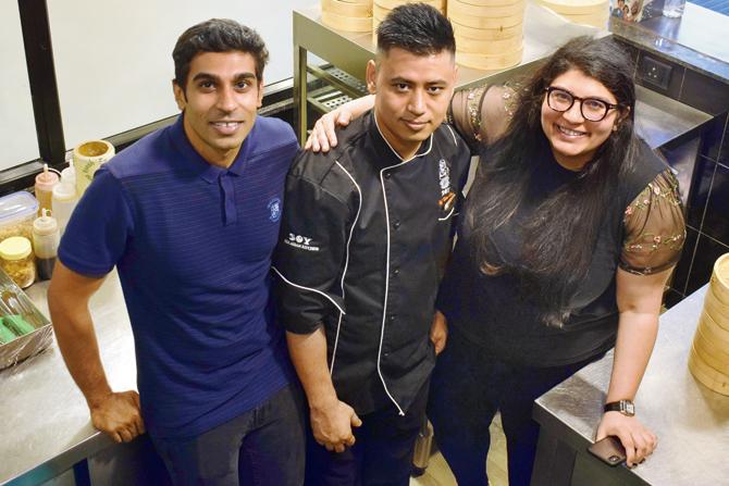 (Left) Arjun Singh and his sister, Avani, with chef Milan Subba. While the Singhs own the restaurant, Subba is the brain behind the menu. Pic/Ashish Raje