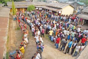 Voters stand in serpentine queues at a polling station in Guwahati, Assam, on Tuesday. Pic/AFP