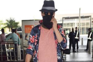 See photos: Irrfan Khan uncovers face, looks in pink of health