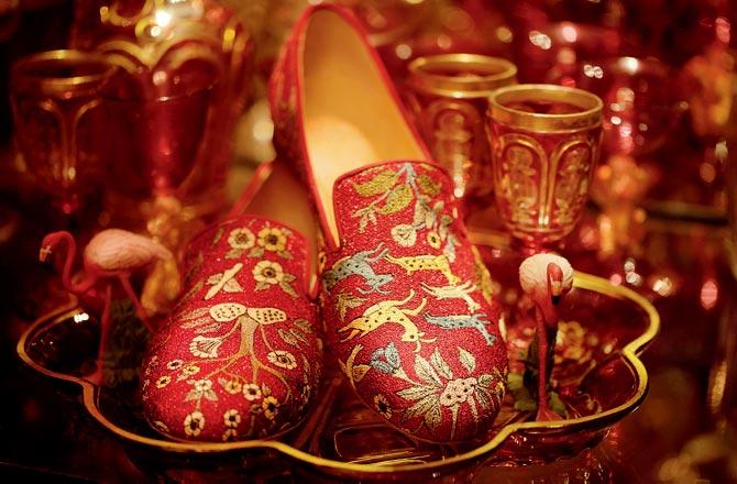 Louboutin on Kashgaar Bazaar 2019: "Sabyasachi imagined it as a gypsy-ish, nomad-ish caravan travelling all around places I-ve visited in the past like Turkey, Iran, Persia… While designing the shoes and the bags, I kept in mind all the mood boards he shared with me, but also infused them with a slightly Parisian twist and a lot of references from my own travels through geometric details from Isfahan and Shiraz architecture, ornamental patterns from the Mughal astronomy gardens in Jaipur and Shalimar, that I mixed on richly hand-sequinned leathers and velvets, sometimes accompanied with the traditional Indian-style tassel, latkan."