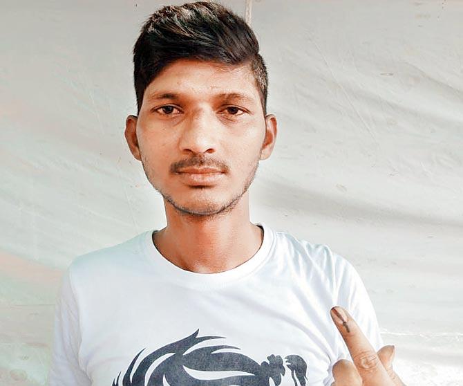 First-time voter Mahesh Babaji Padyal from Versova