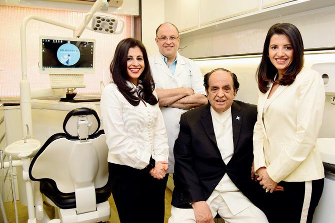 Orthodontist, Dr Keki Mistry, at his India House rooms. His children (from left, clinic coordinator Kainaz Mistry, and dentists Dr Rushitum Mistry and Dr Saiesha Mistry) now practise here. Pic/Shadab Khan