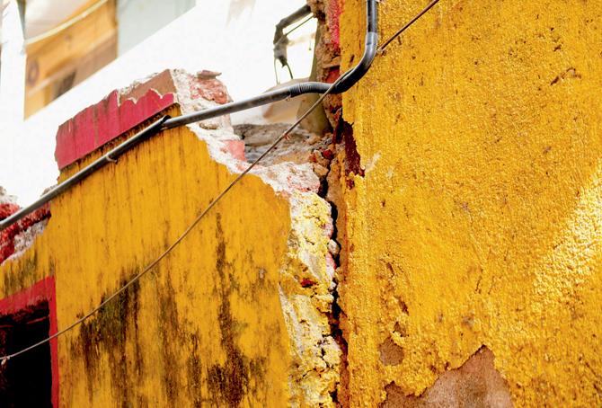 Zeebah Yazdi points to the debris in her balcony. Pics/Bipin Kokate