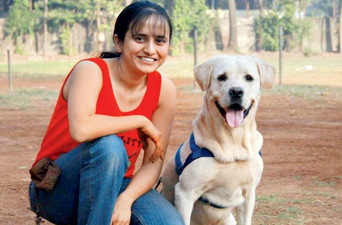 Pooja Sathe Gawande and her dog Jazz, who passed away in 2018