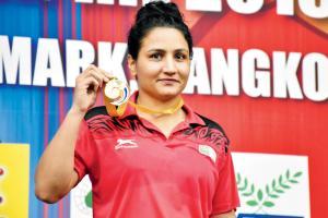 Pooja, first Indian woman boxer to win Asian gold