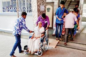Wheelchairs and volunteers assist physically challenged in Palghar