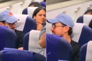 Watch video: Aamir flies economy, surprises co-passengers on flight