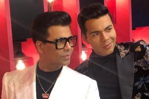 Karan Johar's wax statue unveiled, filmmaker has a fun time with family