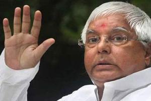 Complaint filed against Lalu Prasad for distributing tickets