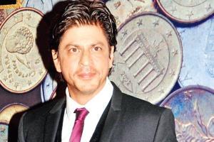 SRK's fun reply to Abhishek Bachchan's tweet leaves fans amused