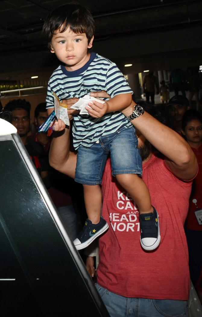 Taimur Ali Khan in no mood to make the tiresome walk at Mumbai airport