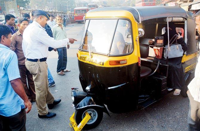 Auto and taxi drivers say they often learn about hefty backdated fines only when they are either stopped by the traffic cops or visit the traffic office. File pic