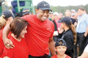 Hope kids are proud of their dad, says an emotional Tiger Woods