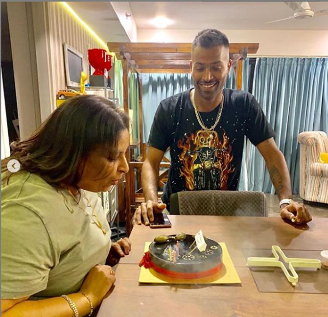 Hardik Pandya is truly a momma's boy! He posted this picture of himself and his mom celebrating her birthday by cutting the birthday cake.