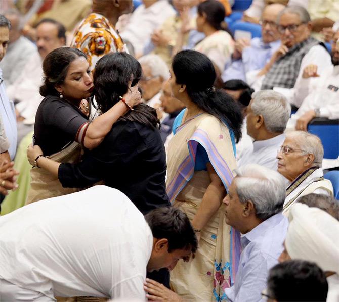 Bollywood actress Shabana Azmi shares a warm hug with Sushma Swaraj's daughter Bansuri Swaraj during the condolence meeting held at New Delhi on Friday.