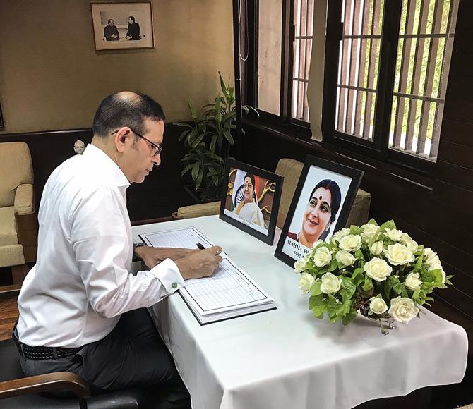 In pic: Ajay Bisaria, Indian High Commissioner to Pakistan pays tribute to former external affairs minister and BJP leader, late Sushma Swaraj in Islamabad, Pakistan.