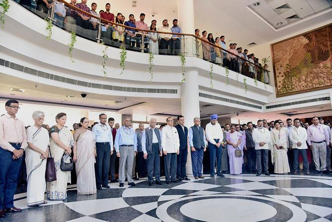 In pic: Members of the Ministry of Foreign Affairs observe silence as they attend a condolence meeting in memory of former external affairs minister, late Sushma Swaraj in New Delhi.