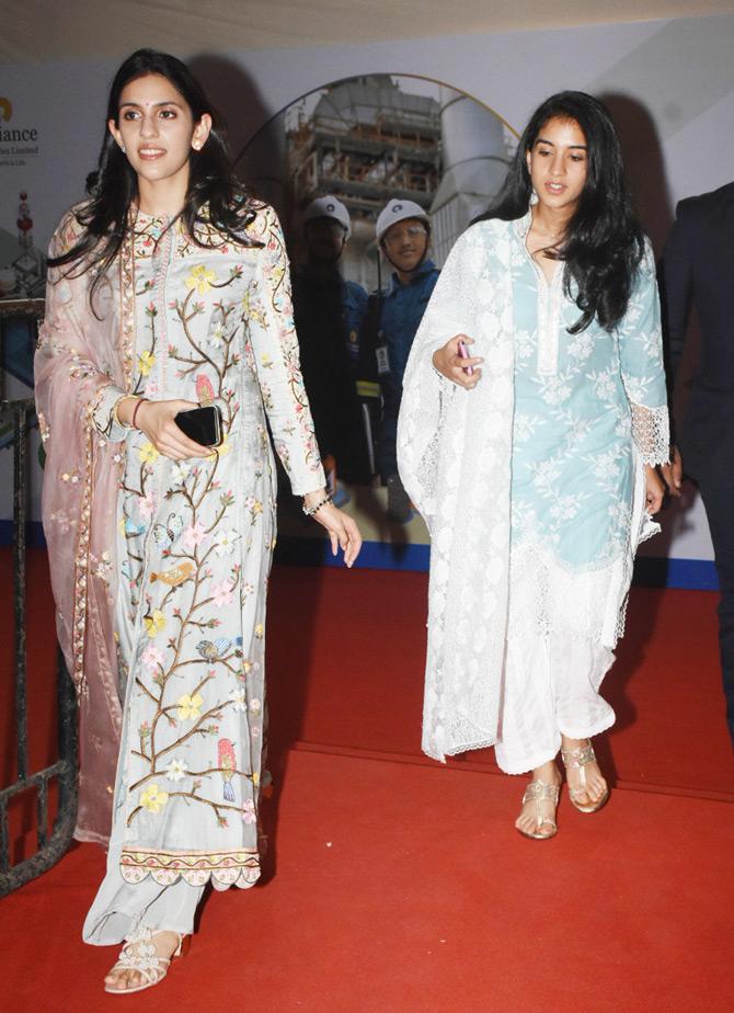 Anant Ambani's friend Radhika Merchant also graced the occasion and was seen twinning with Shloka Mehta. For the event, Radhika donned a blue and white salwar suit with floral prints which complimented her white laced dupatta.
In pic: Shloka Mehta and Radhika Merchant arrive for the Reliance AGM in South Mumbai.