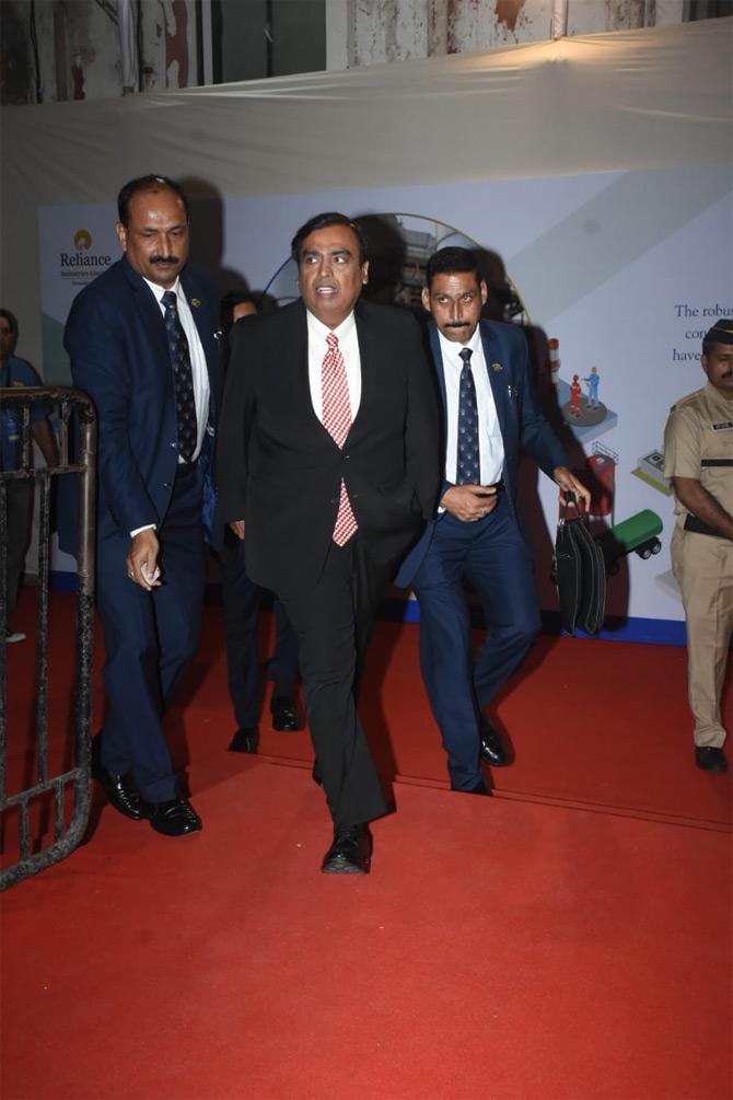 The 42nd Annual General Meeting (AGM) of Reliance Industries was also graced by Mukesh Ambani's mother Kokilaben Ambani and Nita Ambani's mother Purnima Dalal.
In pic: Mukesh Ambani arrives at Birla Matushri Sabhagar for the annual meeting held in South Mumbai.