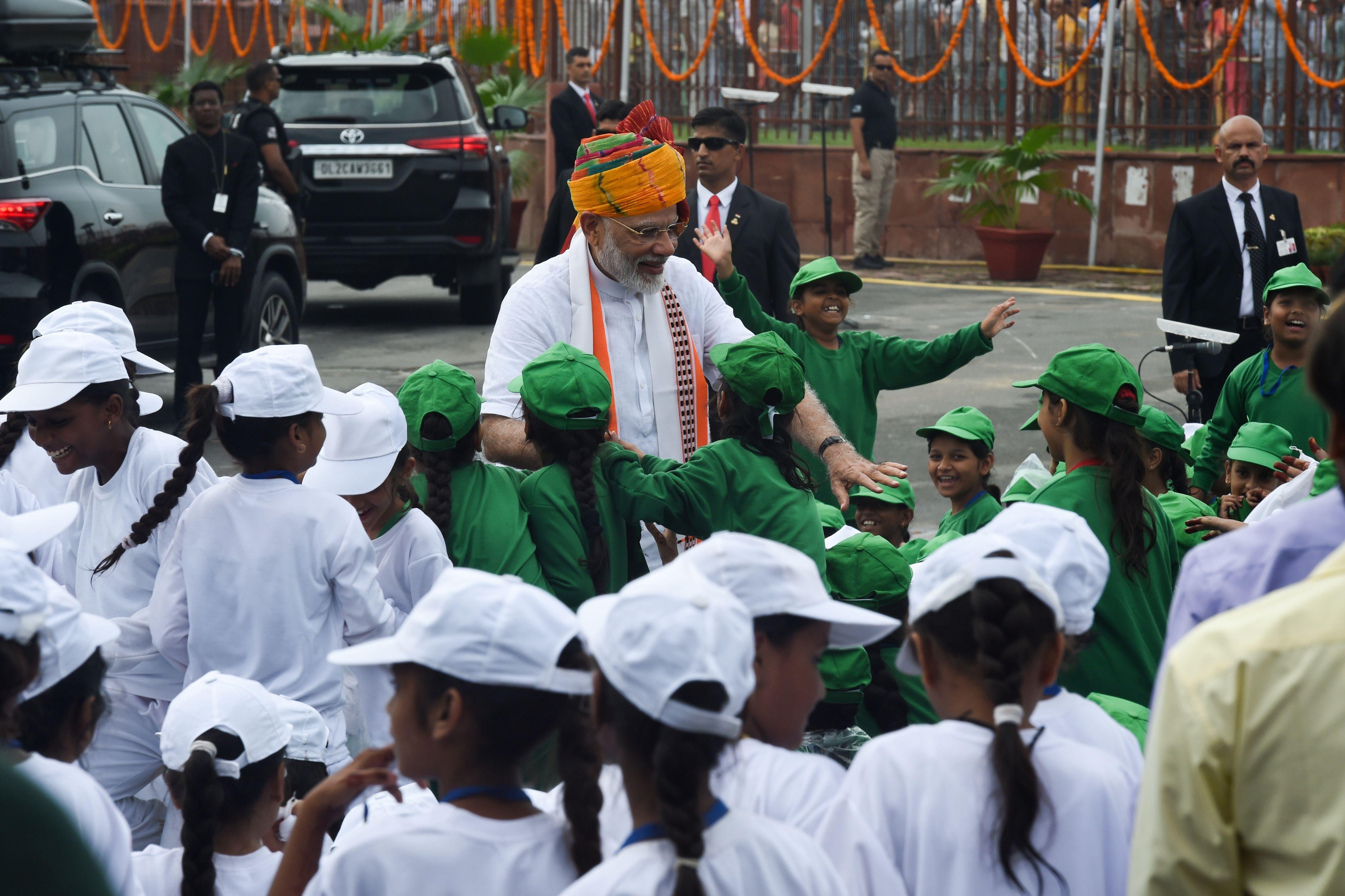 India's Prime Minister Narendra Modi greets children during a ceremony to celebrate country's 73rd Independence Day at the Red Fort in New Delhi on August 15, 2019. Pic/AFP