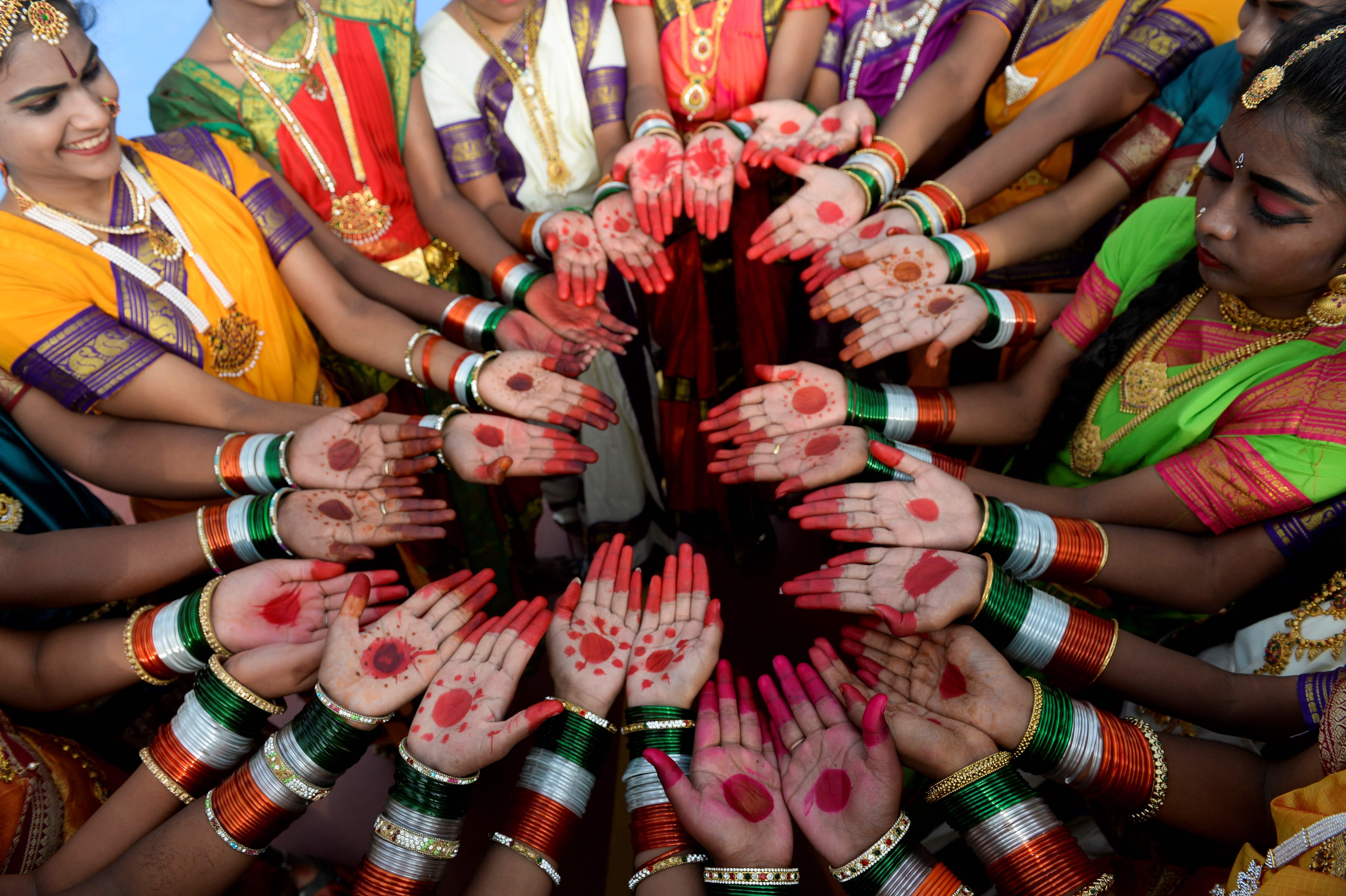 Girls wearing tricolours bangles pose before participating in a ceremony to celebrate the country's 73rd Independence Day on August 15, 2019. Pic/AFP