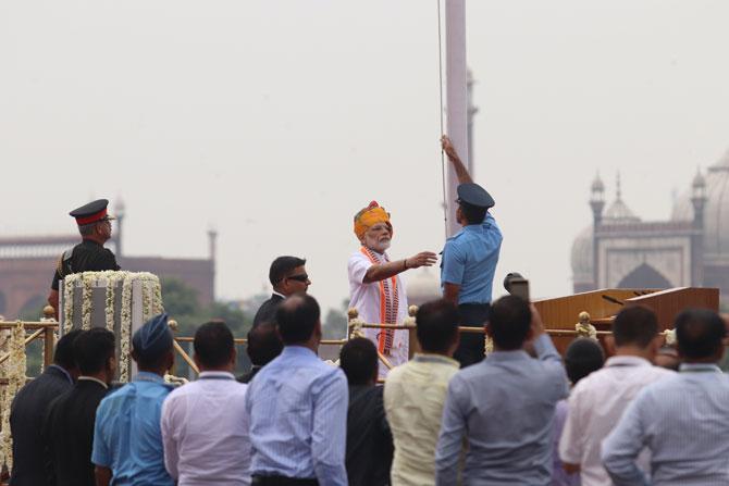 The Prime Minister then inspected the Guard of Honour. As he delivered the customary Independence Day speech, the mood of the crowd at Red Fort is something you can't miss. It was a lovely morning at the Red Fort as light showers made the historic monument shine even brighter
