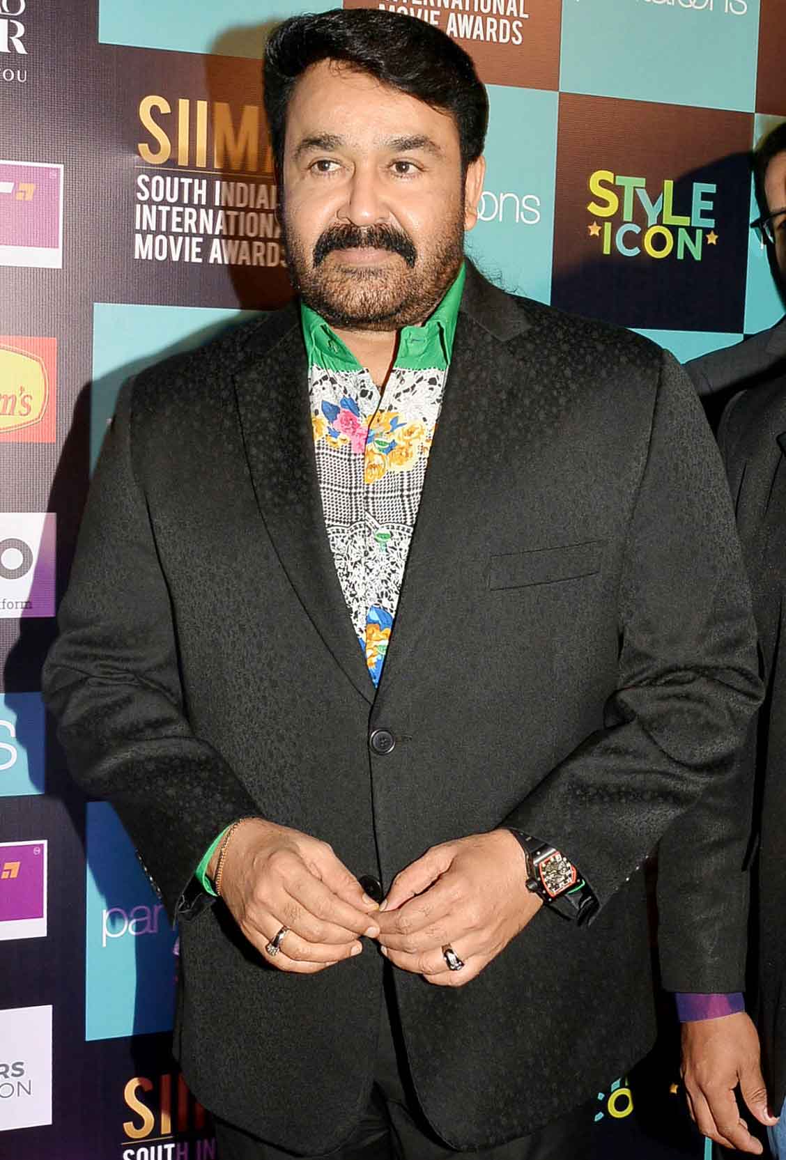 Mohanlal looked dapper in his black suit paired with a printed shirt. The actor will next be seen in the Tamil film Kaappaan.