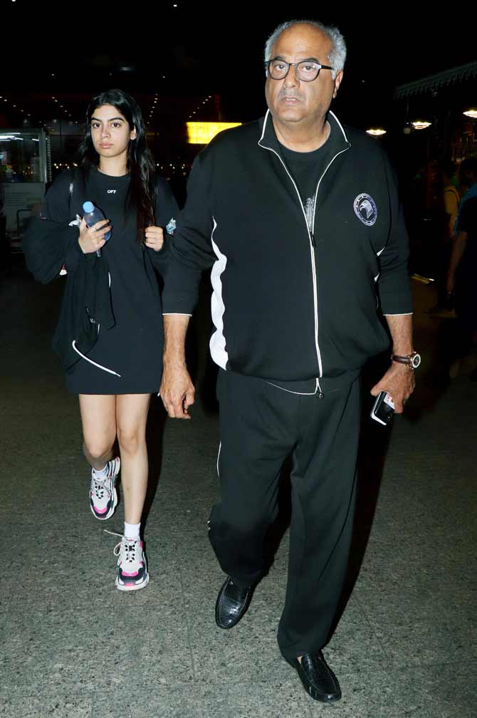 Boney Kapoor along with daughter Khushi Kapoor was spotted at the Mumbai airport. Filmmaker and daughter return from their trip to Bali. The duo along with Janhvi and other Kapoor family members had gone for a wedding. All pictures/Yogen Shah