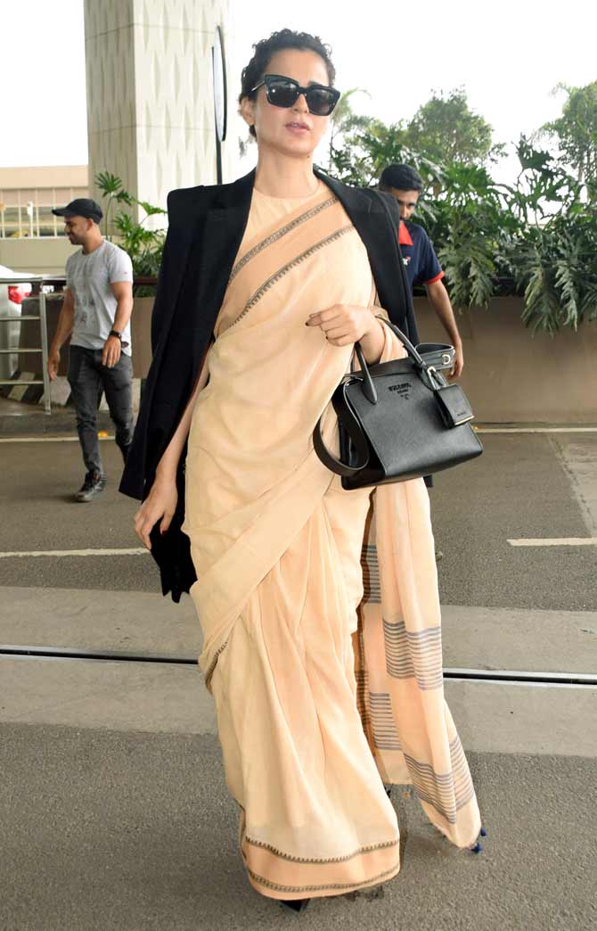 Kangana Ranaut looked elegant in a saree and jacket as she arrived at the Mumbai airport. Kangana's latest outing Judgementall Hai Kya had hit theatres on July 26. She will also be seen in 'Panga' and 'Dhaakad'.