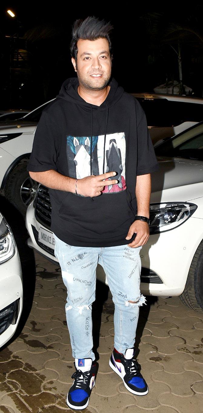 Varun Sharma happily posed for the photographers as he arrived for the special screening of Khandaani Shafakhana at the Andheri Multiplex.