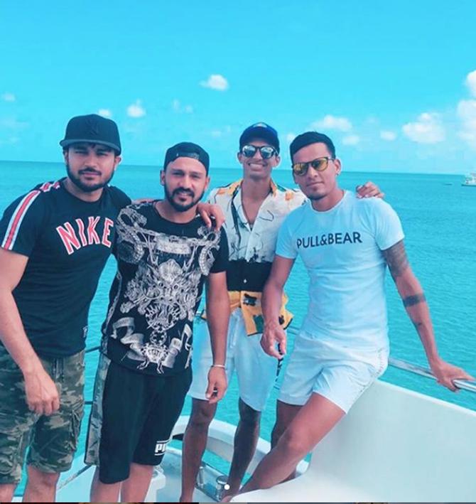 Navdeep Saini posted this picture with fellow cricketers during a holiday in the waters of Antigua