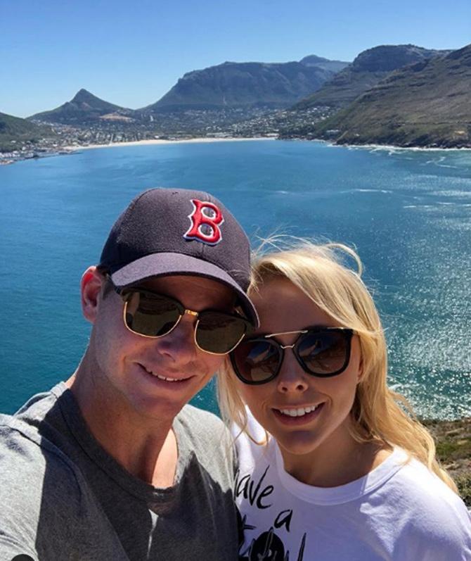 At the IPL 2014, Steve Smith, he was signed by Rajasthan Royals and played 10 matches scoring just 147 runs in total at an average of 36.75.
Steve Smith's wife Dani Willis posted this picture of herself with the cricketer at Cape Town, South Africa.