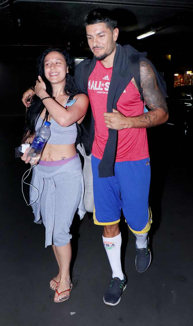 Krishna Shroff was all smiles when spotted at the Mumbai airport. She opted for grey gym gear as her airport look.