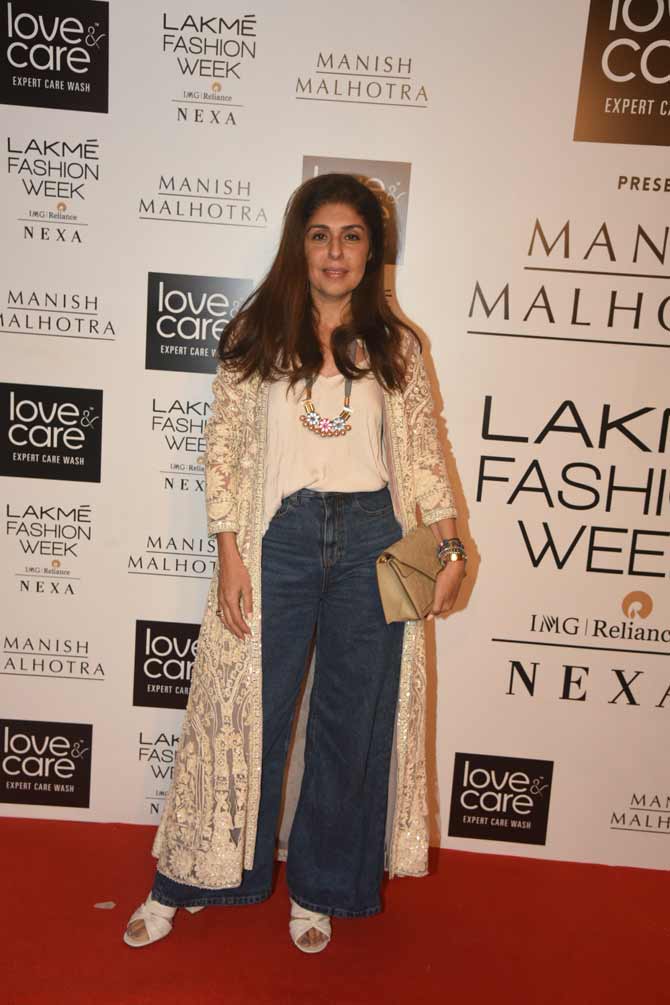 Anaita Shroff Adajania, the host of the digital talk show Feet Up With The Stars, walked the red carpet event at her casual best. She opted for an embroidered shrug, paired with wide-legged denims and a basic white tee for the event.