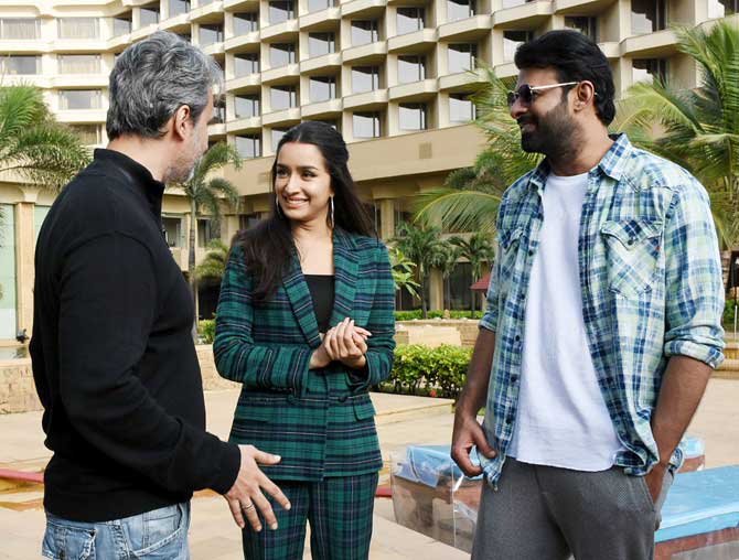 Shraddha Kapoor and Prabhas were caught in a discussion with Homi Adajania during the promotional event.