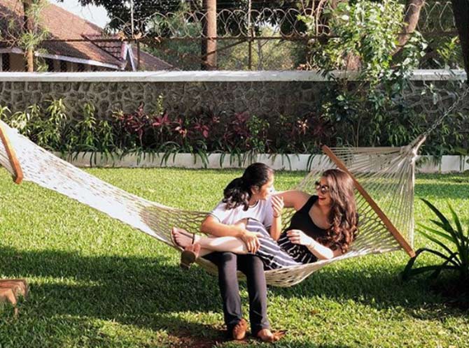 Sara loves to hang out with her best friends, here she is seen sharing a joke with one of her BFFs on a hammock