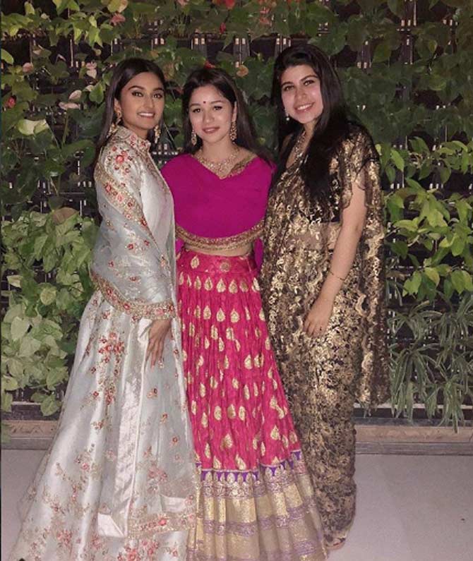 Sara Tendulkar looks absolutely stunning in this pink lehenga while attending a marriage. In this photo, she poses with a couple of her friends