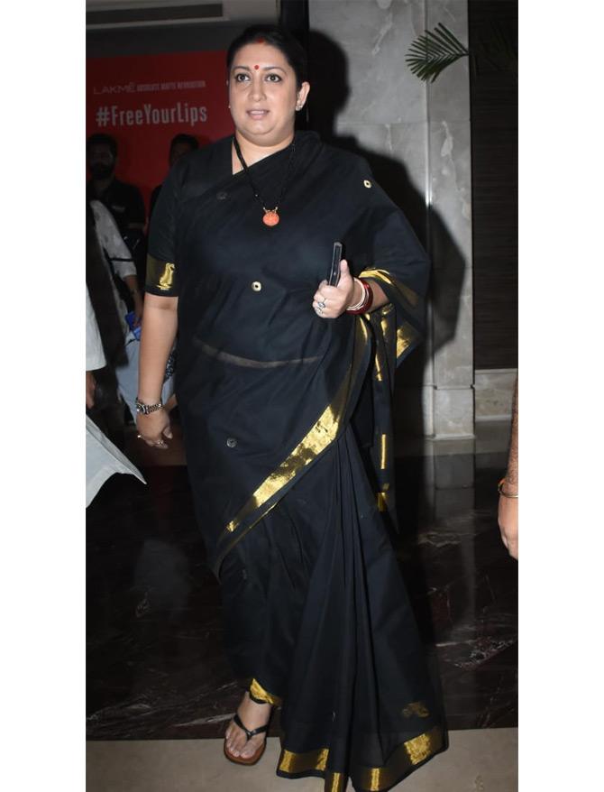 In picture: Union Minister Smriti Irani snapped by the paparazzi as she leaves for the day after attending the Lakme Fashion Week 2019.