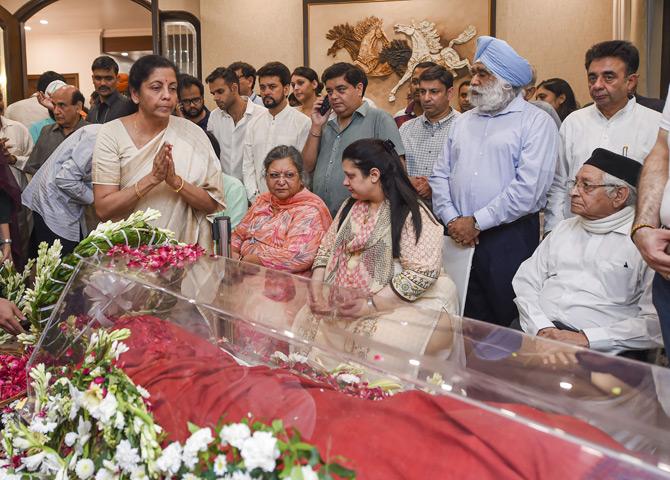 Finance Minister Nirmala Sitharaman pays her last respects by laying a wreath on the mortal remains of former Finance Minister and BJP leader Arun Jaitley, who passed away at the All India Institute of Medical Sciences on Saturday afternoon