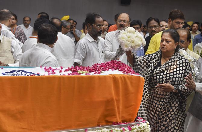 In pic: Former Rajasthan Chief Minister Vasundhara Raje pays her last respects to the mortal remains of former Finance Minister Arun Jaitley at BJP headquarters in New Delhi