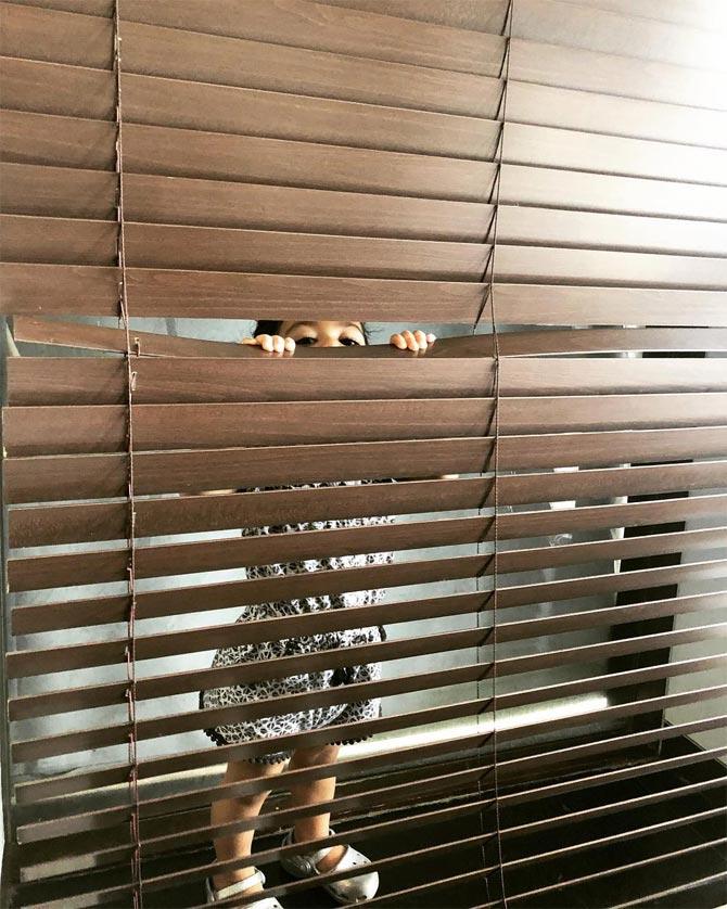 Mira Rajput Kapoor shared this cute snap of Misha playing peek-a-boo and wrote alongside: Brown Bear Brown Bear what do you see?
