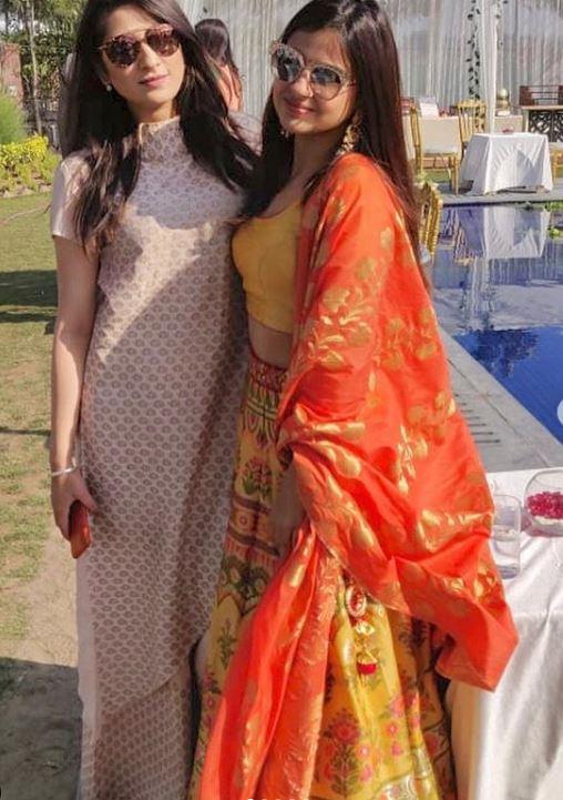 In picture: Sakshi Dhoni poses in a lovely yellow and orange lehenga during a friend's wedding