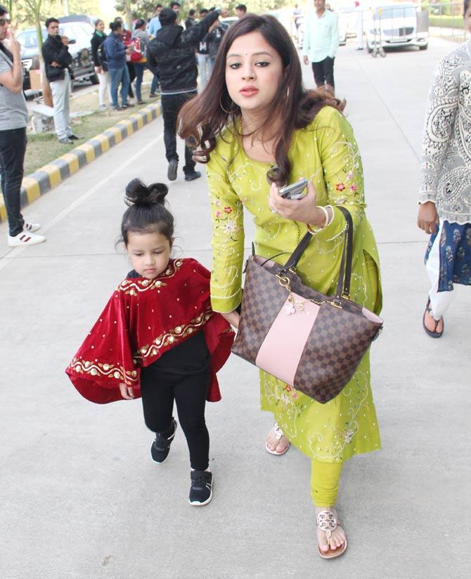 In picture:  The mother-daughter duo of Sakshi Dhoni and Ziva Dhoni at the airport in Udaipur. Sakshi Dhoni was looking radiant in a green salwar kameez.