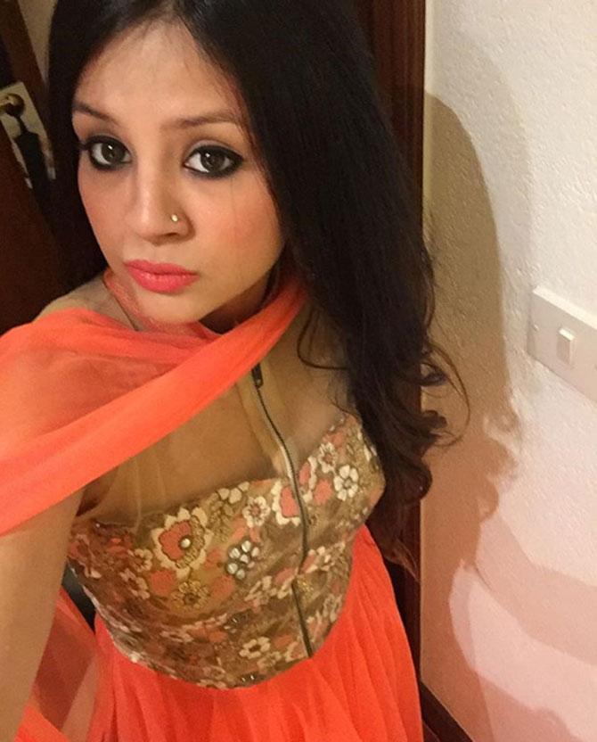Sakshi Dhoni loves to pose in her outfit before going for an event, here she is seen posing in an orange lehenga.