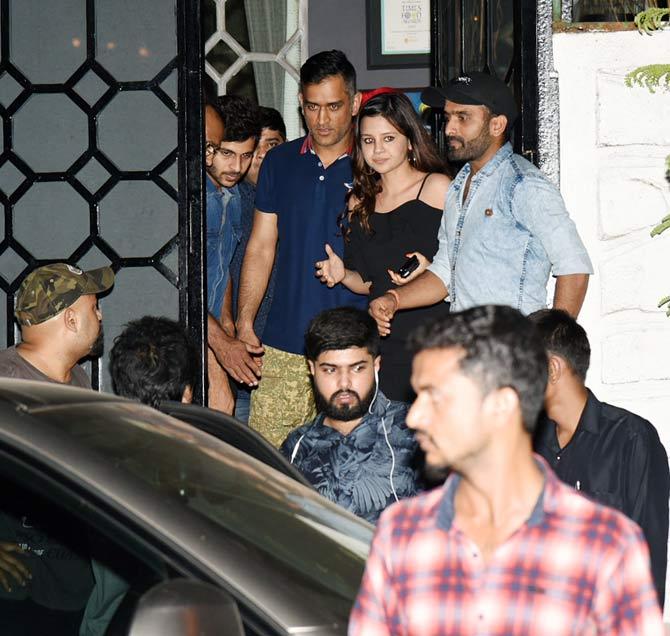 Sashi Dhoni spotted with MS Dhoni outside a restaurant in Mumbai.