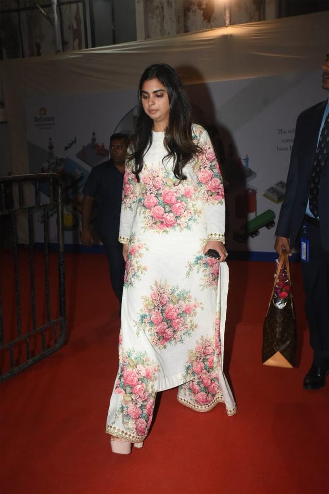 For the AGM meeting, Isha Ambani donned a white floral ethnic ensemble and completed her look with diamond studs, nude lipstick, and subtle make-up. The Ambani scion left her long tresses open which gave her a natural look