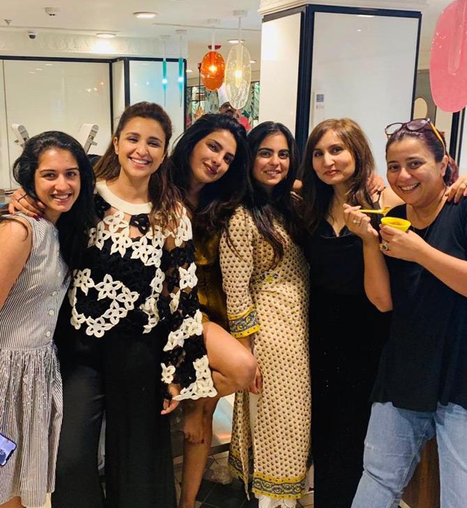 For the girl's night, Isha sported minimal accessories, no make-up and left her long tresses open. 