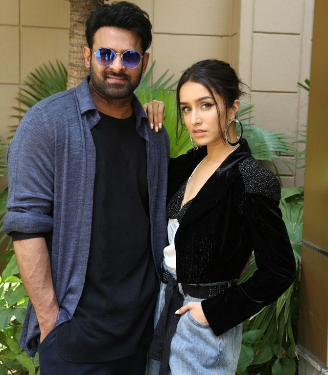 Prabhas in a recent interview with PTI said that the record set by Baahubali films can be broken any Friday. He also said that any filmmaker with a strong storyline can set new benchmarks today.
In picture: Prbhas and Shraddha Kapoor at the promotional event of Saaho in New Delhi