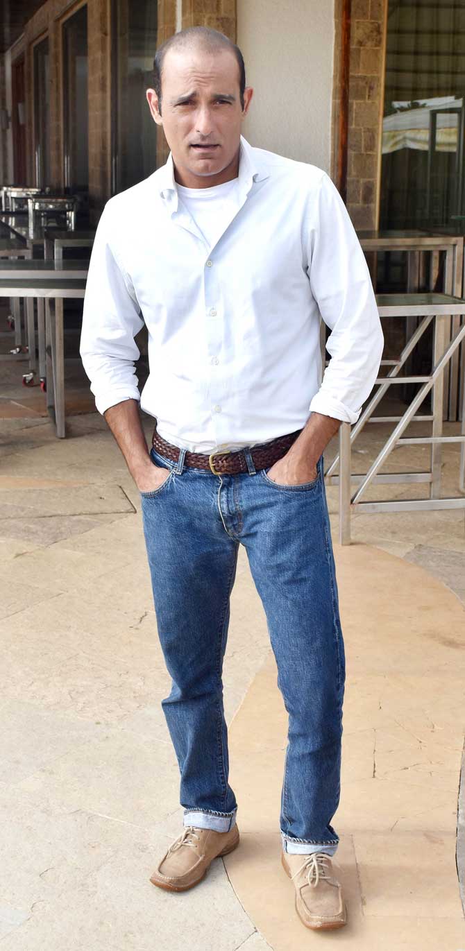 Akshaye Khanna poses for the photographers as he attends a promotional event of his upcoming film Section 375 which also stars Richa Chadha.